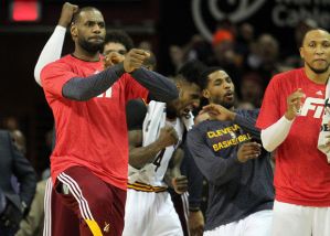 LeBron reacts to Kyrie's three-pointer